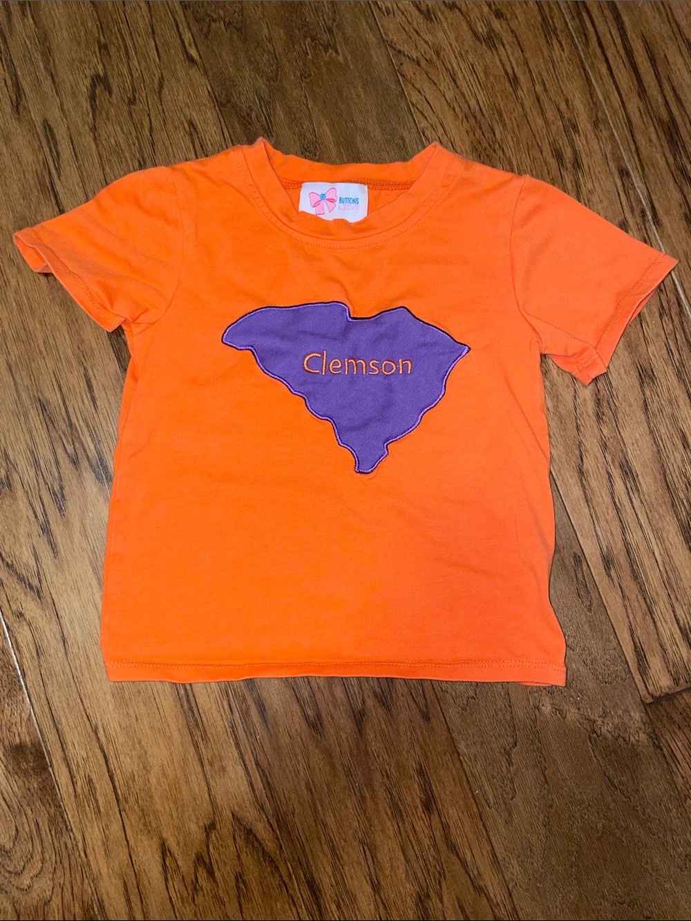 Clemson Short-Sleeve Kids Tee in Bright Orange with Purple Graphic